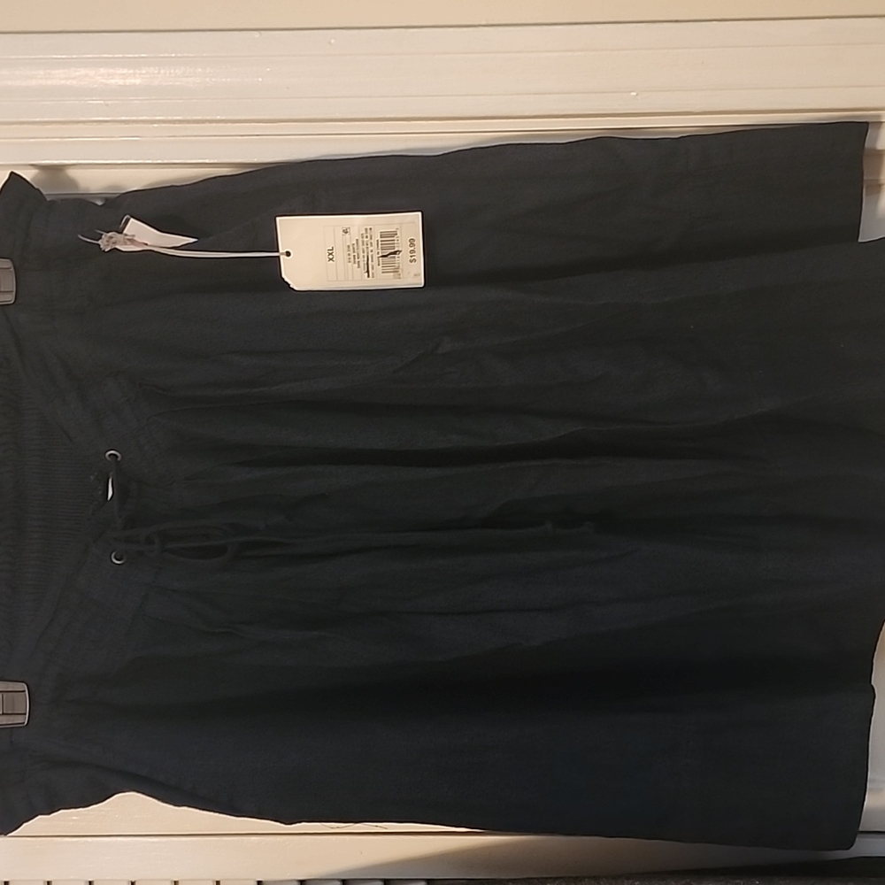 Dark Denim skirt with pockets and drawstring waistline.